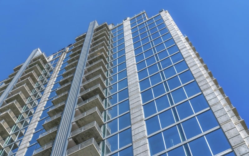 facade apartment units blue sky background downtown austin texas city